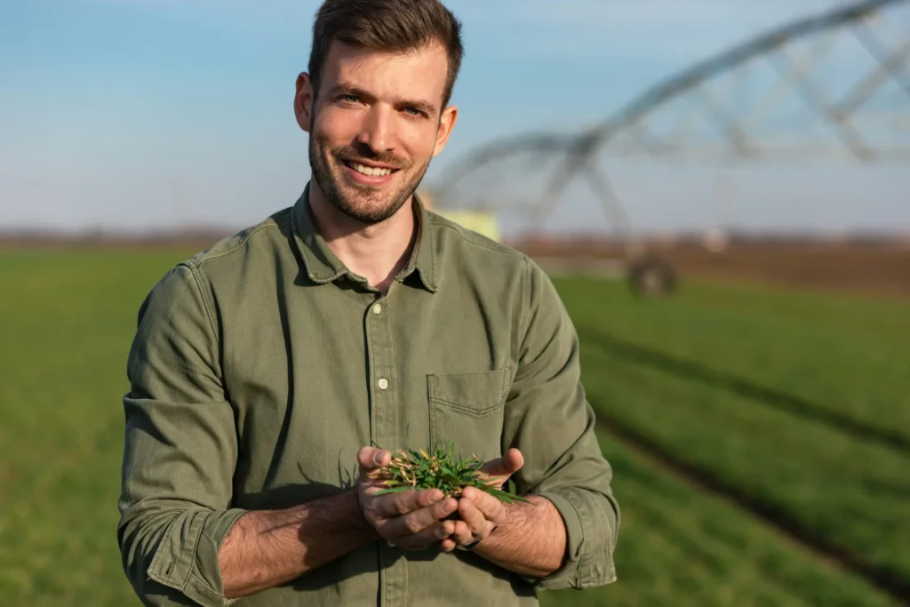 Man with handful of dirt